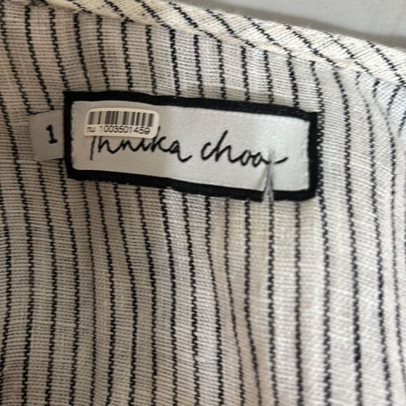 Elegant Ruffled Striped Mini Dress with Floral Details - Picture 5 of 9